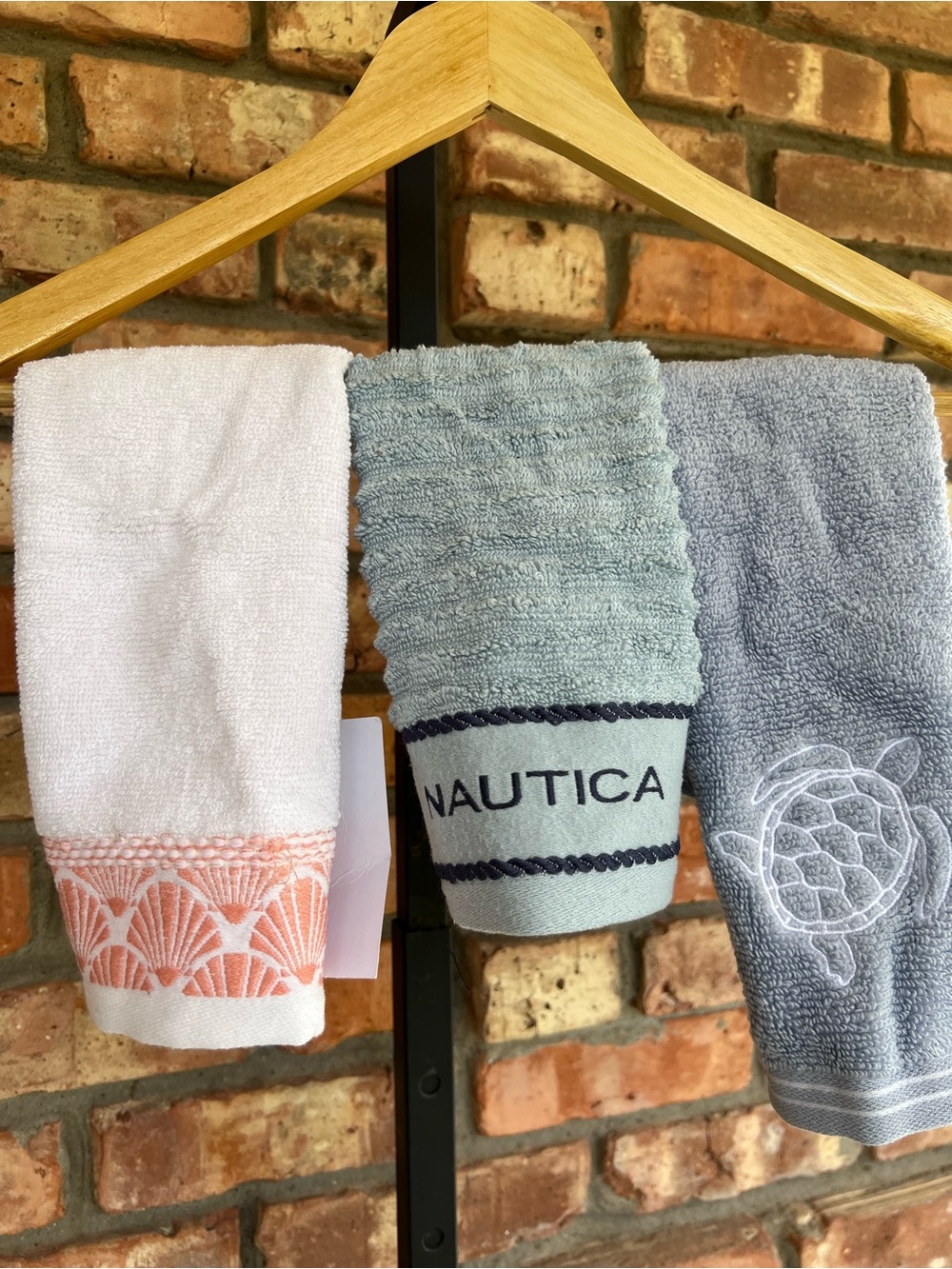 Nautica Set of White, Light Blue, and Gray Hand Towels with Embroidered Details